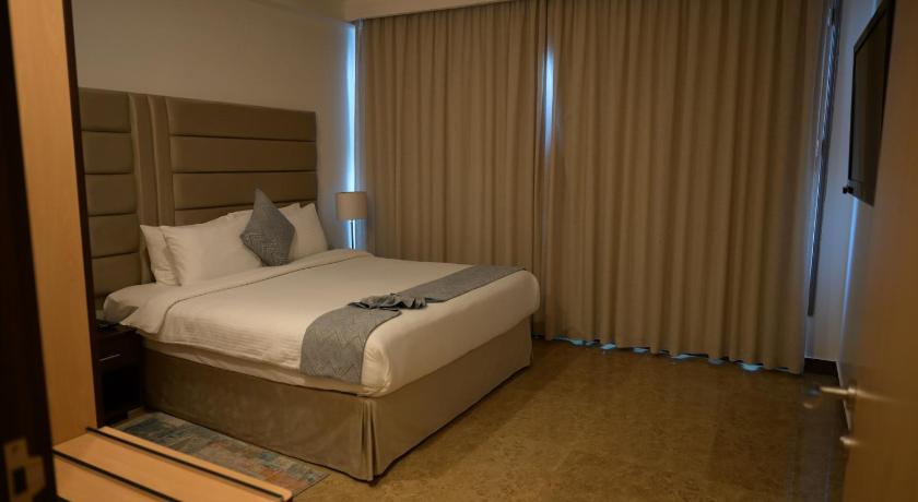 Image of Apartment - 1 King Bed, Smoking Room, One Bedroom, Kitchenette, Sofa, Microwave And Refrigerator, Wi 9