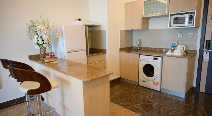 Image of Apartment - 1 King Bed, Smoking Room, One Bedroom, Kitchenette, Sofa, Microwave And Refrigerator, Wi 1