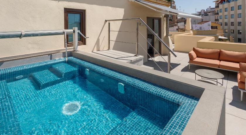 Immagine di Camera Superior Matrimoniale/Doppia con Letti Singoli con Terrazza e Piscina (Superior Double or Twin Room with Terrace and Pool) 5