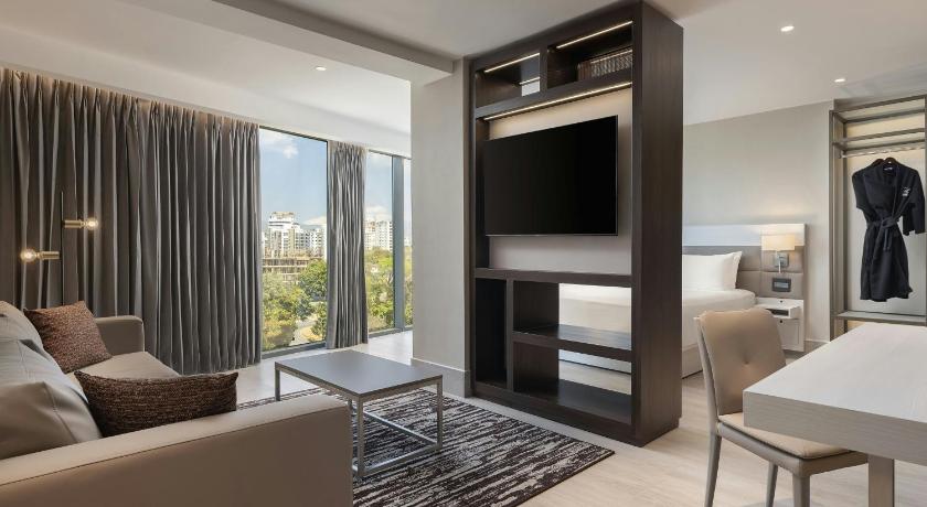 Image of King Suite with Sofa Bed and City View 1