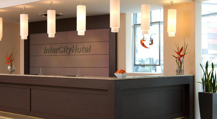 a large room with a large counter and a large window, IntercityHotel Mainz in Mainz