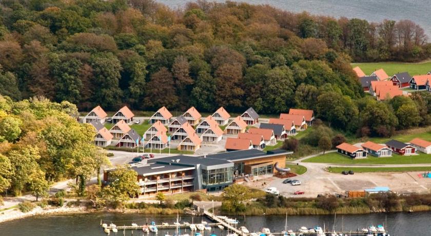 8 person holiday home on a holiday park in Grasten