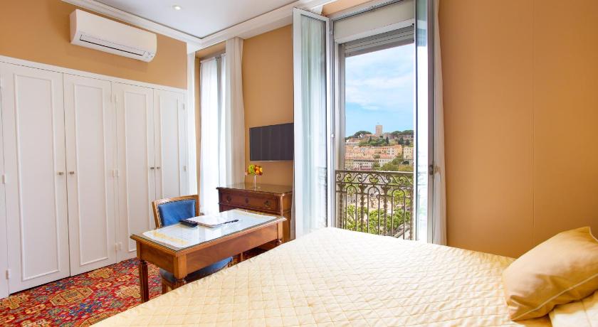 Image of Family Suite, Adjacent rooms, with sea and city view 3