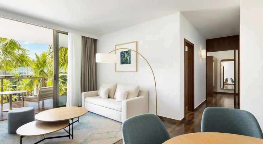 Image of Two-Bedroom Suite with Balcony and Pool View 0