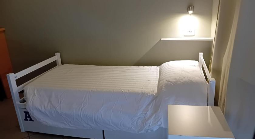 Image of Single Bed in Female Dormitory Room 0