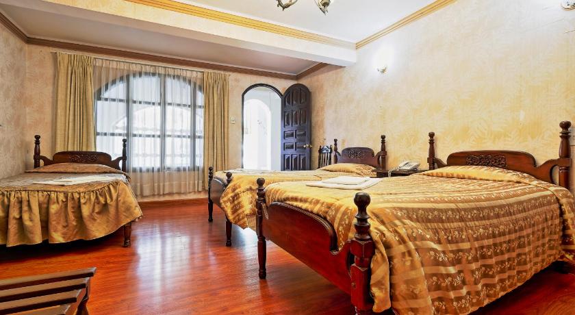 Image of Triple Room with Private Bathroom 0