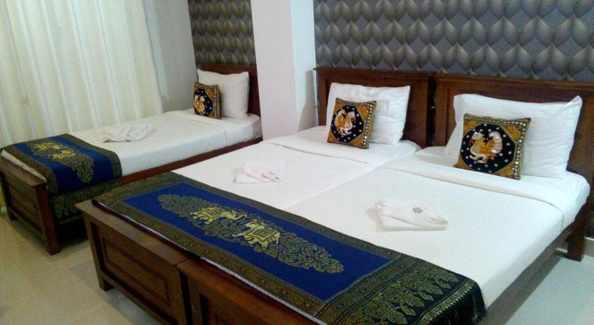 Image of Deluxe Triple Room 10