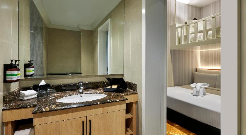 Image of Two-Bedroom Family Apartment with One King Bed, Two Single Beds and One Triple Bunk Bed 11