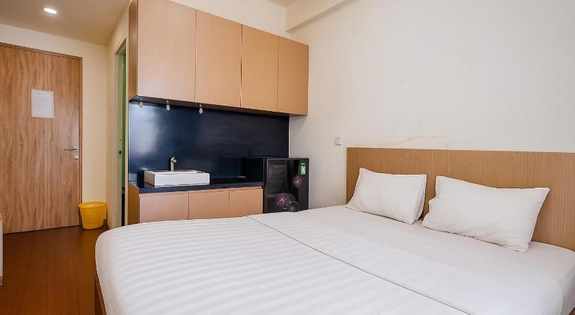Quintessa Room at Candiland Apartement - image 7