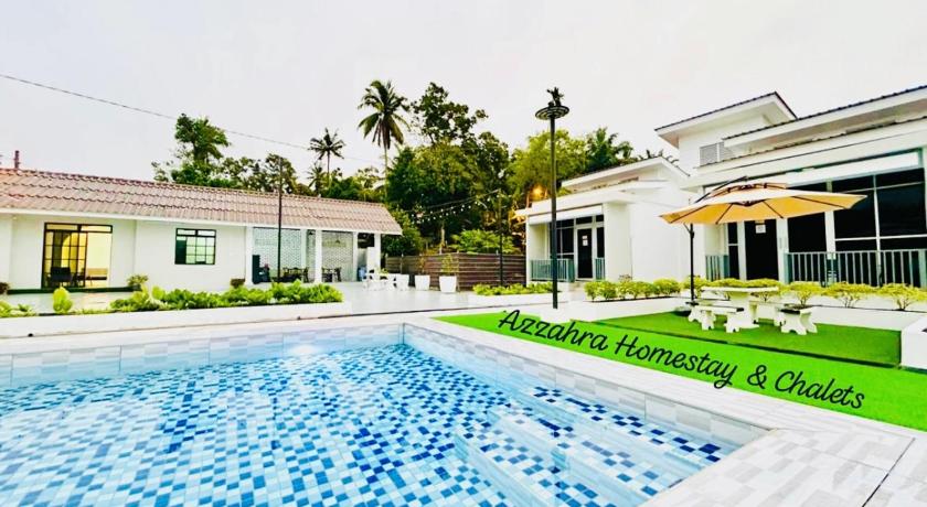 テメルロー AZZAHRA HOMESTAY & CHALETS 5つ星 ホテル レストラン