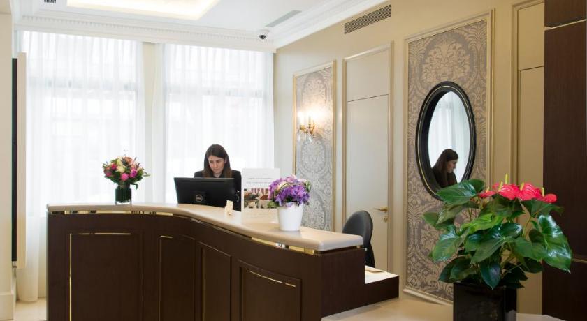 a large room with a large counter top and a large mirror, Hotel Saint Petersbourg Opera & Spa in Paris