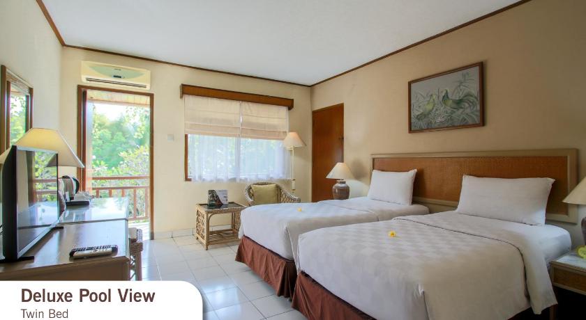 Deluxe 2 külön ággyal kilátással a medencére (Deluxe Pool View Twin room) fotója 0