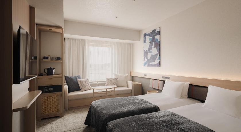 Image of Deluxe Twin Room with Bathroom - Non-Smoking 0