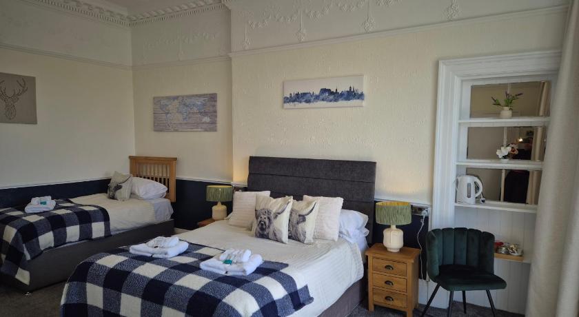 Image of Triple Room with City View 2