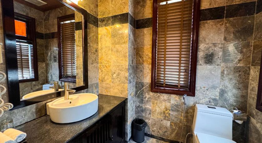 Immagine di Suite con Vista Piscina (Suite with Pool View) 11