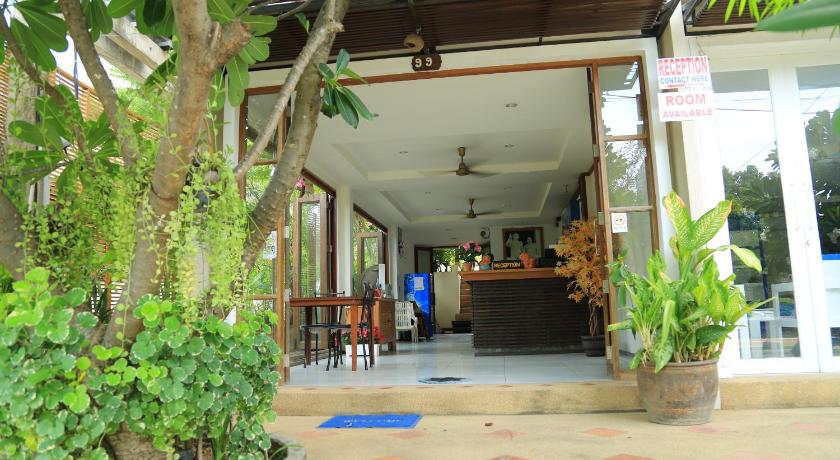 a large room with a patio area and a walkway, Sasitara Residence in Koh Samui