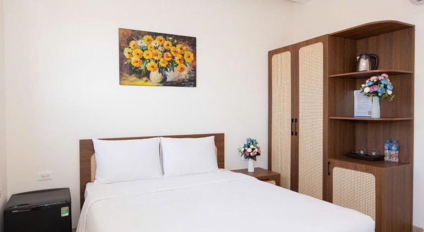 Phòng Deluxe Giường Đôi Có Ban Công (Deluxe Double Room with Balcony)tooltipPhòng Deluxe Giường Đôi Có Ban Công (Deluxe Double Room with Balcony)