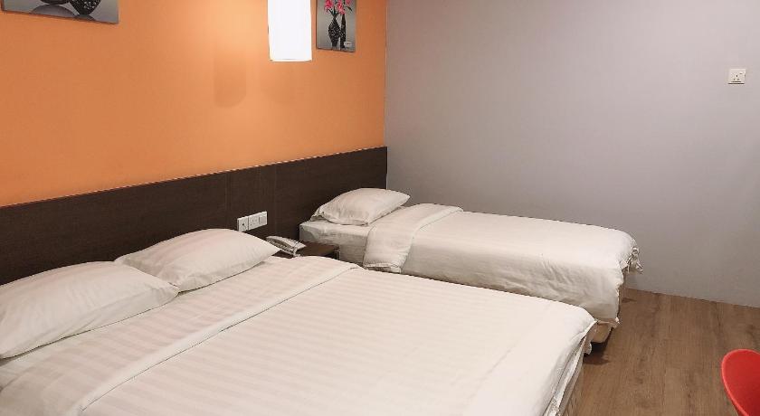Image of Triple Room with One Queen and One Single Bed 0