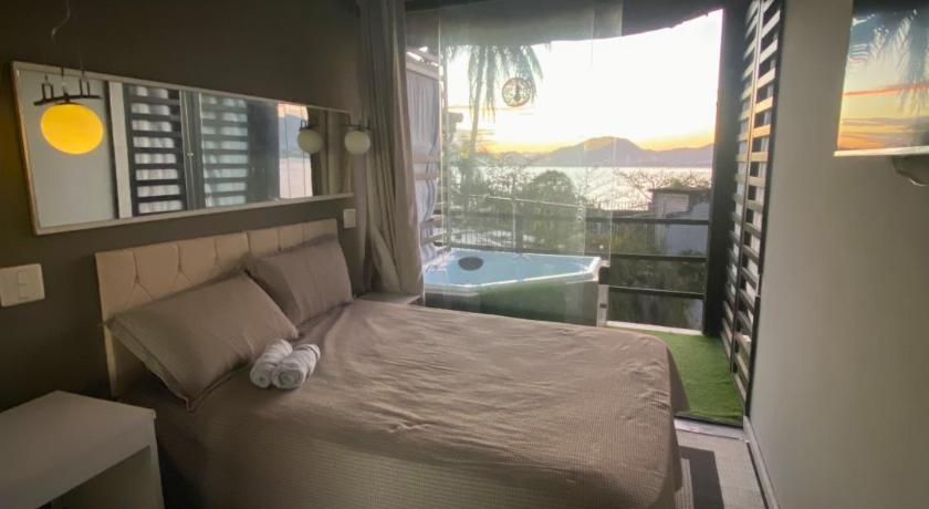 グアルジャ Casamar paraiso na praia com a vista do mar dos sonhos piscina e spa 4つ星 ゲストハウス 眺望