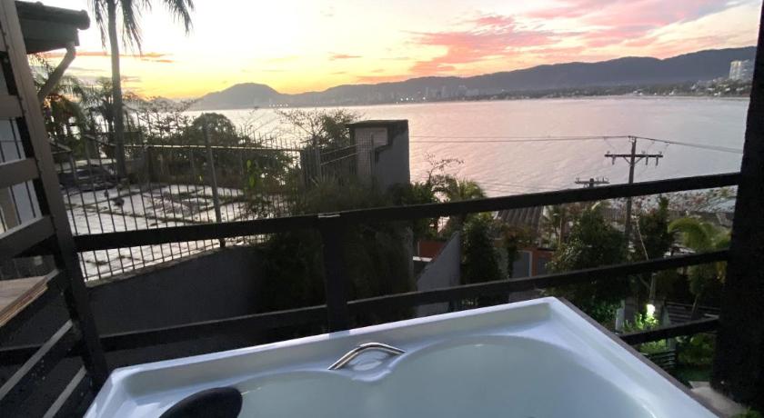 グアルジャ Casamar paraiso na praia com a vista do mar dos sonhos piscina e spa 4つ星 ゲストハウス 施設