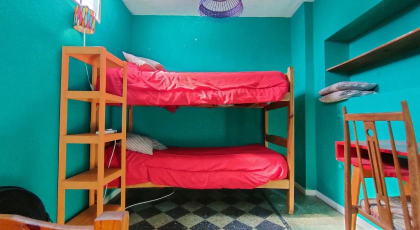 Image of Basic Triple Room with Shared Bathroom 0