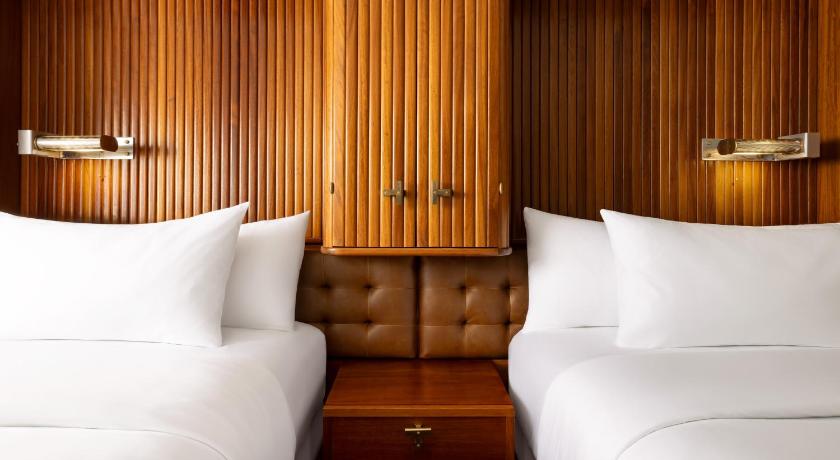 Image of Classic Room with Two Double Beds and Roll-In Shower - Mobility and Hearing Accessible 1