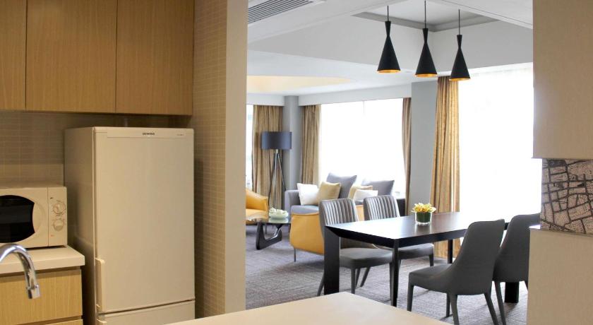 Фото: Люкс с 2 спальнями (2 Bedroom Suite) 1