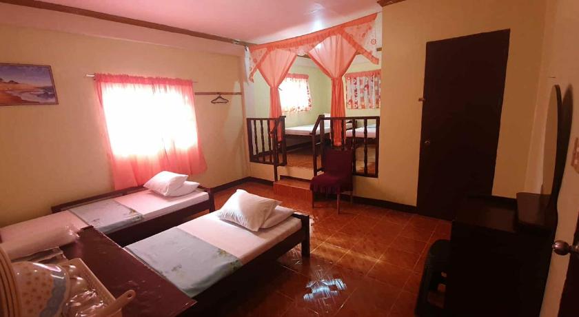 Image of Quadruple Room with Private Bathroom 0