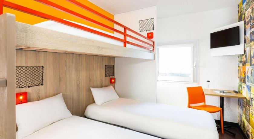 Image of Break Room with Three Single Bunk Beds and Shared Bathroom 0
