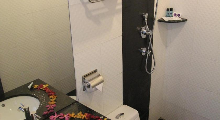 a bathroom with a toilet and a sink, Venus Boutique Hotel in Malacca