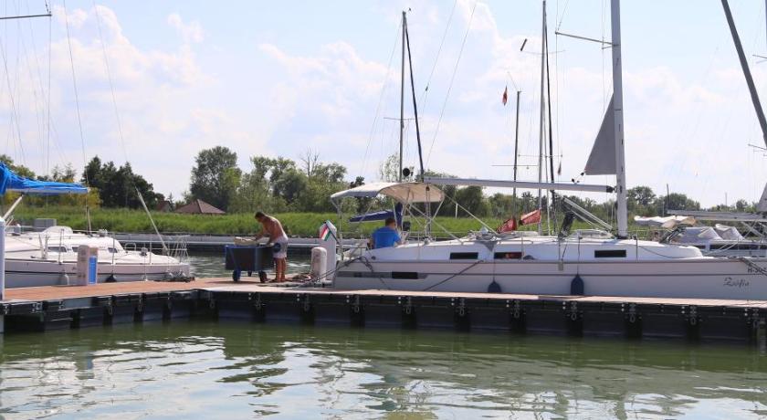 a number of boats docked in a body of water, Fenyves Yacht Club Superior in Balatonlelle
