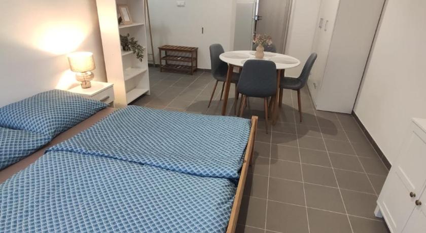 Photo de Krásny nový prízemný apartmán - Réservation à prix Agoda