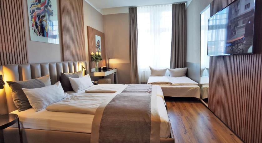 Četrvietīgs numurs (Quadruple Room) attēls 1