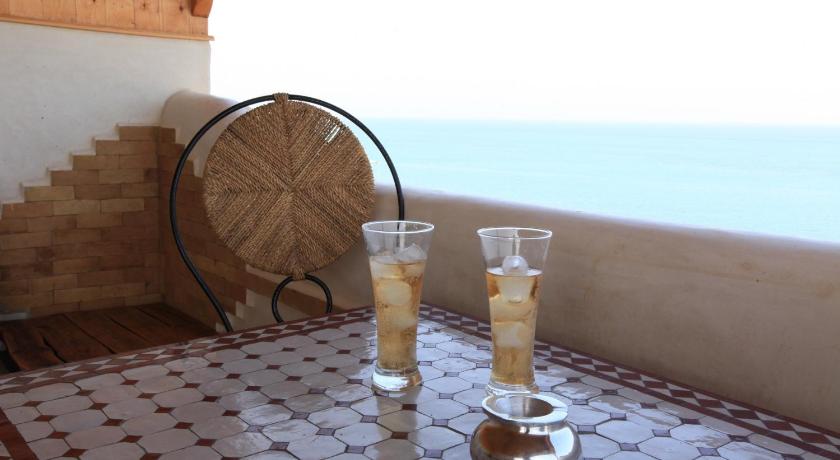 Image of Quadruple Room with Sea View 8