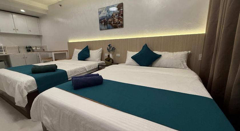 Image of Queen Room with Two Queen Beds 0