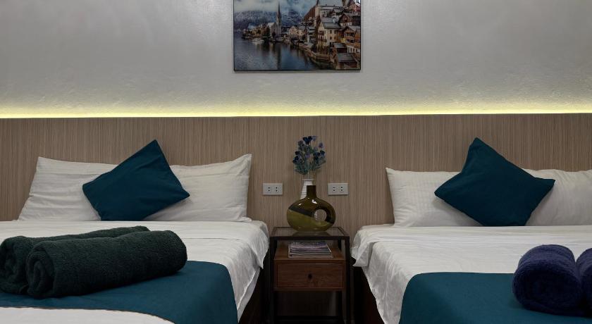Image of Queen Room with Two Queen Beds 4