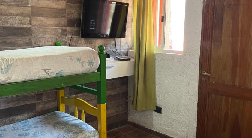 Image of Quadruple Room with Private Bathroom 0