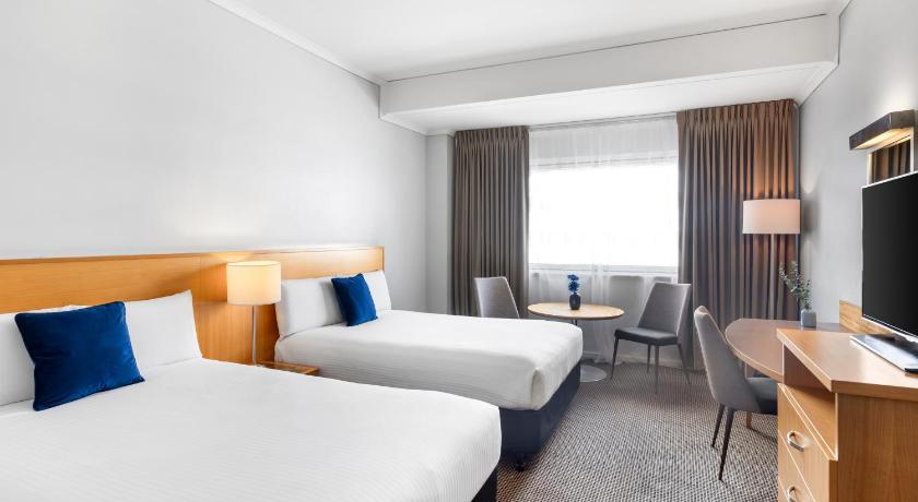 Foto Classic Room 2 Double Beds 0