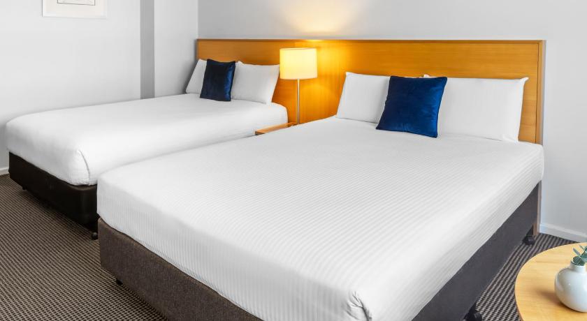 Foto Classic Room 1 Queen and 1 Double Bed 1