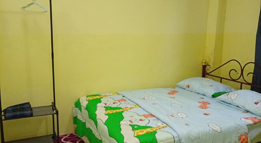 タナ・メラ an nisa homestay & roomstay jeli 3つ星 シングルルーム レストラン