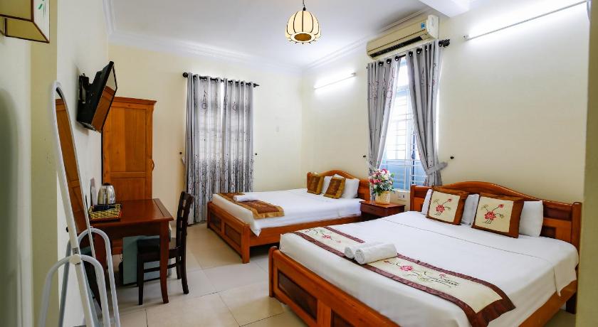 Image of Deluxe Triple Room 0