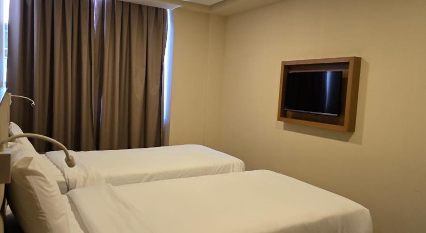 Зображення Стандартний двомісний номер з 2 односпальними ліжками (Standard Twin Room) 3