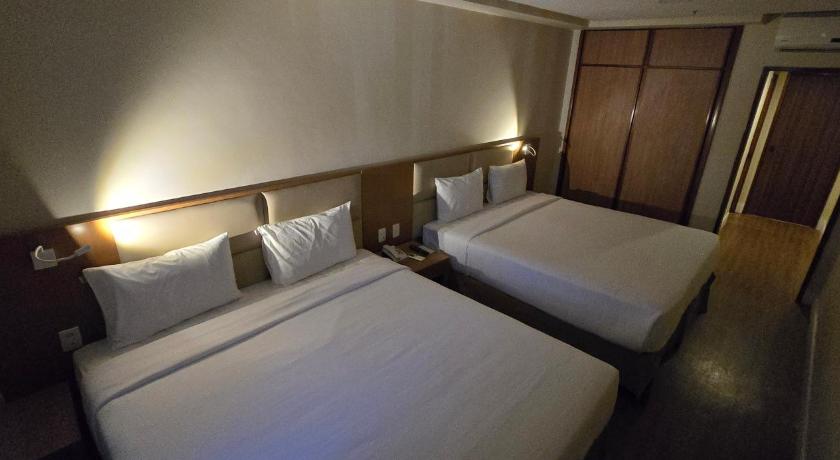 Зображення Двомісний номер Делюкс із 2 двоспальними ліжками. (Deluxe Double Room with Two Double Beds) 1