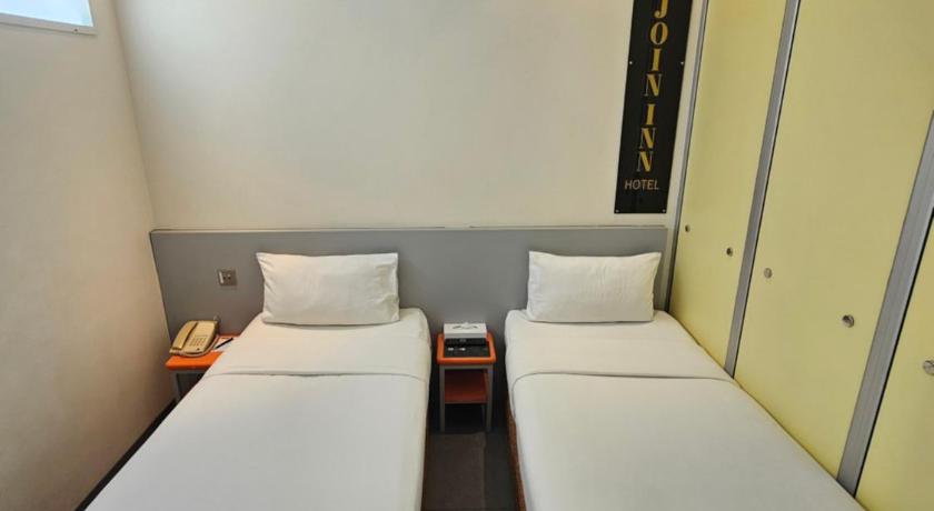 Image of Budget Twin Room without Window 7