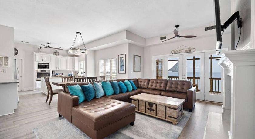 Jaw-dropping bayfront home with panoramic water views, boat slip, and cowboy pool