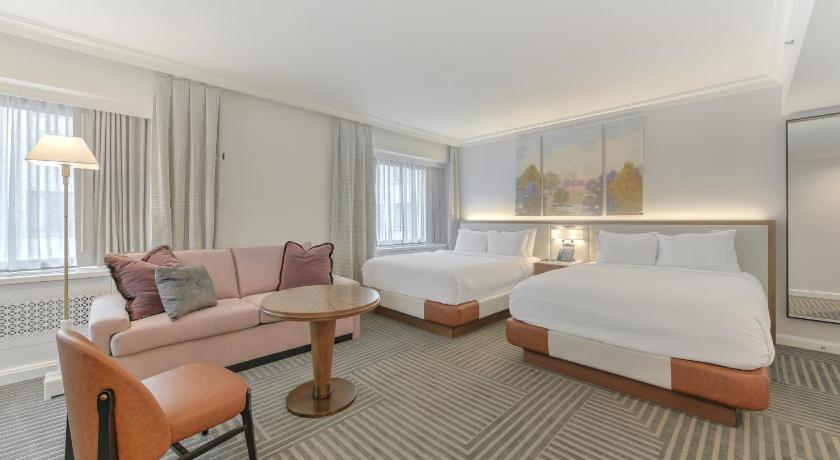 Image of 2 Double Beds Deluxe Room - City View 1