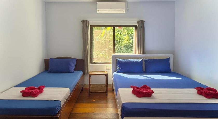 Image of Deluxe Triple Room 0