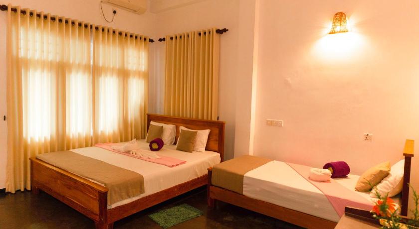 Image of Super Deluxe Triple Room With Balcony 3