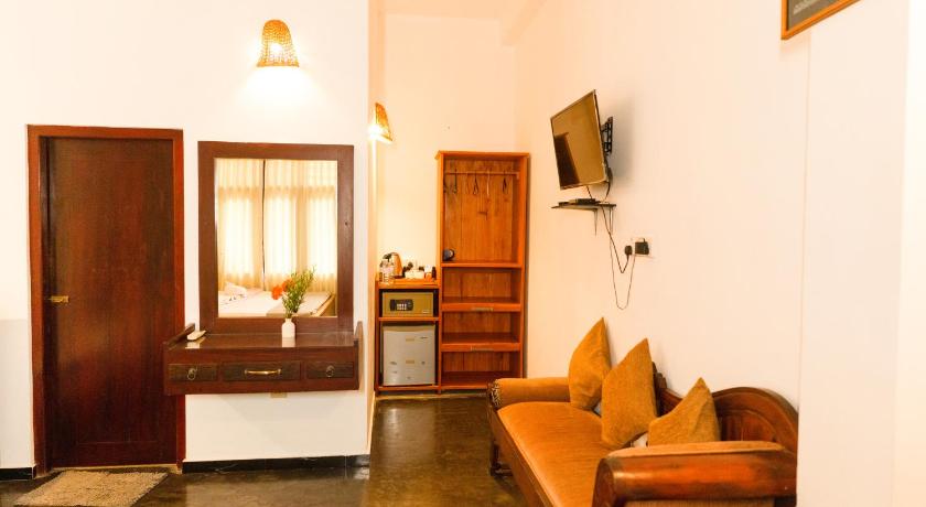 Image of Super Deluxe Triple Room With Balcony 4