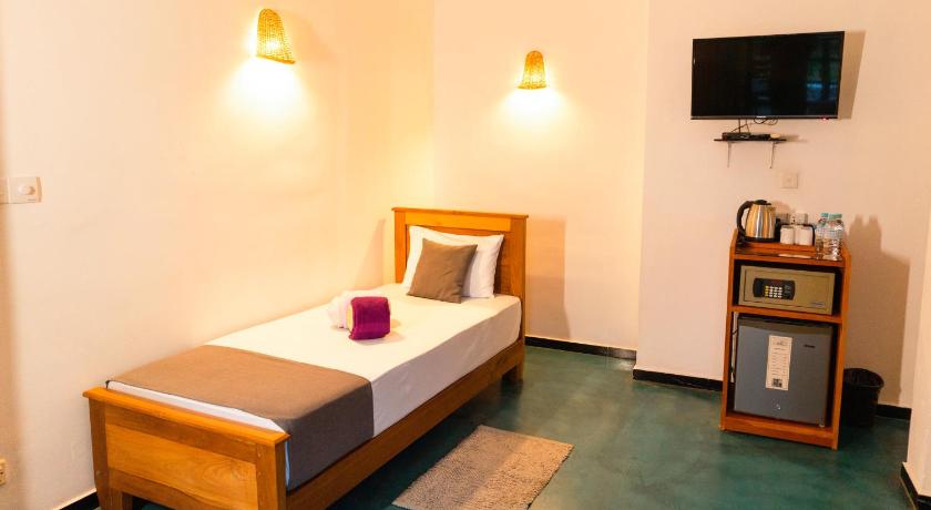 Image of Super Deluxe Triple Room With Balcony 6